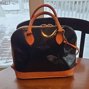 Dooney & Bourke Glossy Black and Tan Satchel